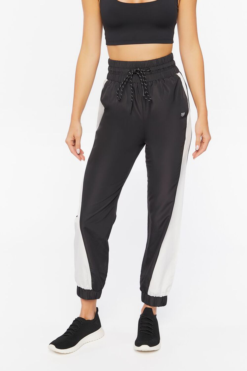 Jogger de Mujer color Negro /Linea blanca